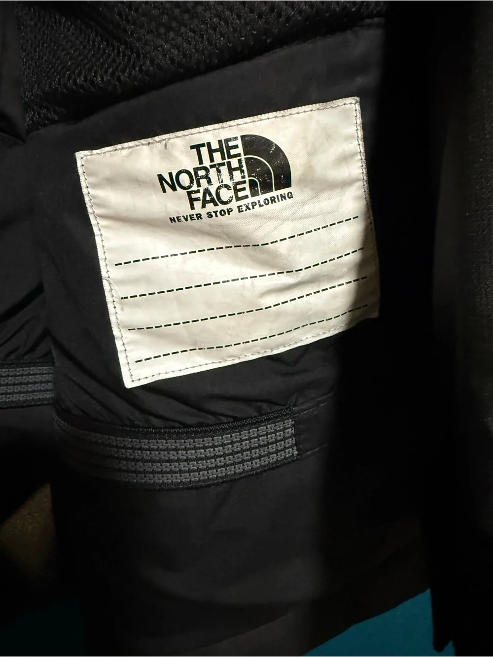 The North Face Kids Black Hooded Shell Jacket with White Logo